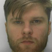 Gloucestershire Police have issued a public appeal to help locate wanted man Jack Budd