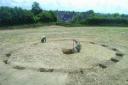 Archaeologists investigate barrow at Kingshill