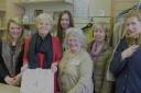 Staff at the Fairford branch of Cotswold Volunteers celebrate the organisation's fourth birthday