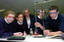 Headteacher Christine Oates watches a science experiment in progress by pupils Emily Tipper, 13, Katie Denyer, 14, Oliver Swindall, 14 and Matt Shutt, 13 at Kinghsill School  
