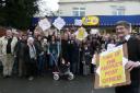 Stratton residents protesting yesterday against the threatened closure of their post office
