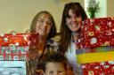 In the family...Operation Christmas Child organiser Joan Townsend with daughter Liza and grandson Jacob, 6. To order this picture call 01285 642642 or visit wiltsglosstandard.co.uk