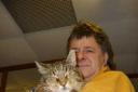 Alan Jefferson-Mackney with Tyler who arrived at the Manor House Farm cattery as a stray with no tail