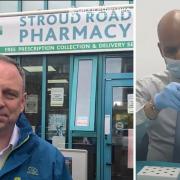 Community tester Matthew (left) outside Stroud Road Pharmacy, Gloucester, where pharmacist Dhiran (right) talks him through how to self-administer a Covid test