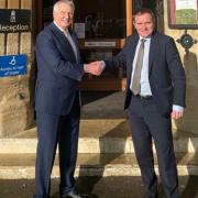 : Professor Peter McCaffery (L), Vice-Chancellor of the Royal Agricultural University, welcomes The Rt Hon George Eustice MP, Secretary of State for Environment, Food and Rural Affairs, to the RAU’s Cirencester campus for the launch the