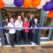 Councillor Eve Silvester, Mayor of Royal Wootton Bassett, cuts the ribbon for Marsh Farm Manor.