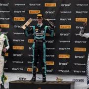 15-year-old Jude Peters (middle) on the podium on debut at the Ginetta Junior Championship