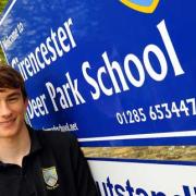 Olympic torchbearer Year 10 student Jake Ashton outside Cirencester Deer Park School