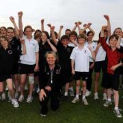 Olympic torchbearer Christina See with some of the Cirencester Kingshill pupils at the after-school athletics club