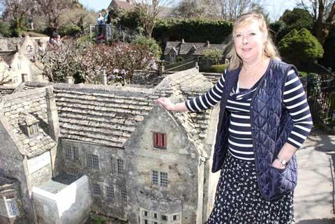 Vicki Atherton, owner of Bourton-on-the-Water Model Village celebrates after it was granted listed building status.