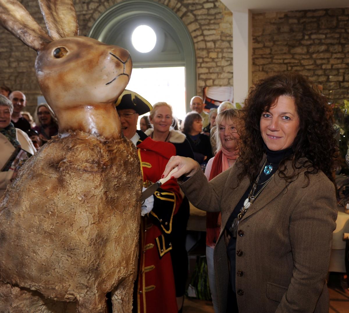 Countess Bathurst cuts the Hare Cake in the Cornhall, as part of the launch of the Hare Festival in Cirencester