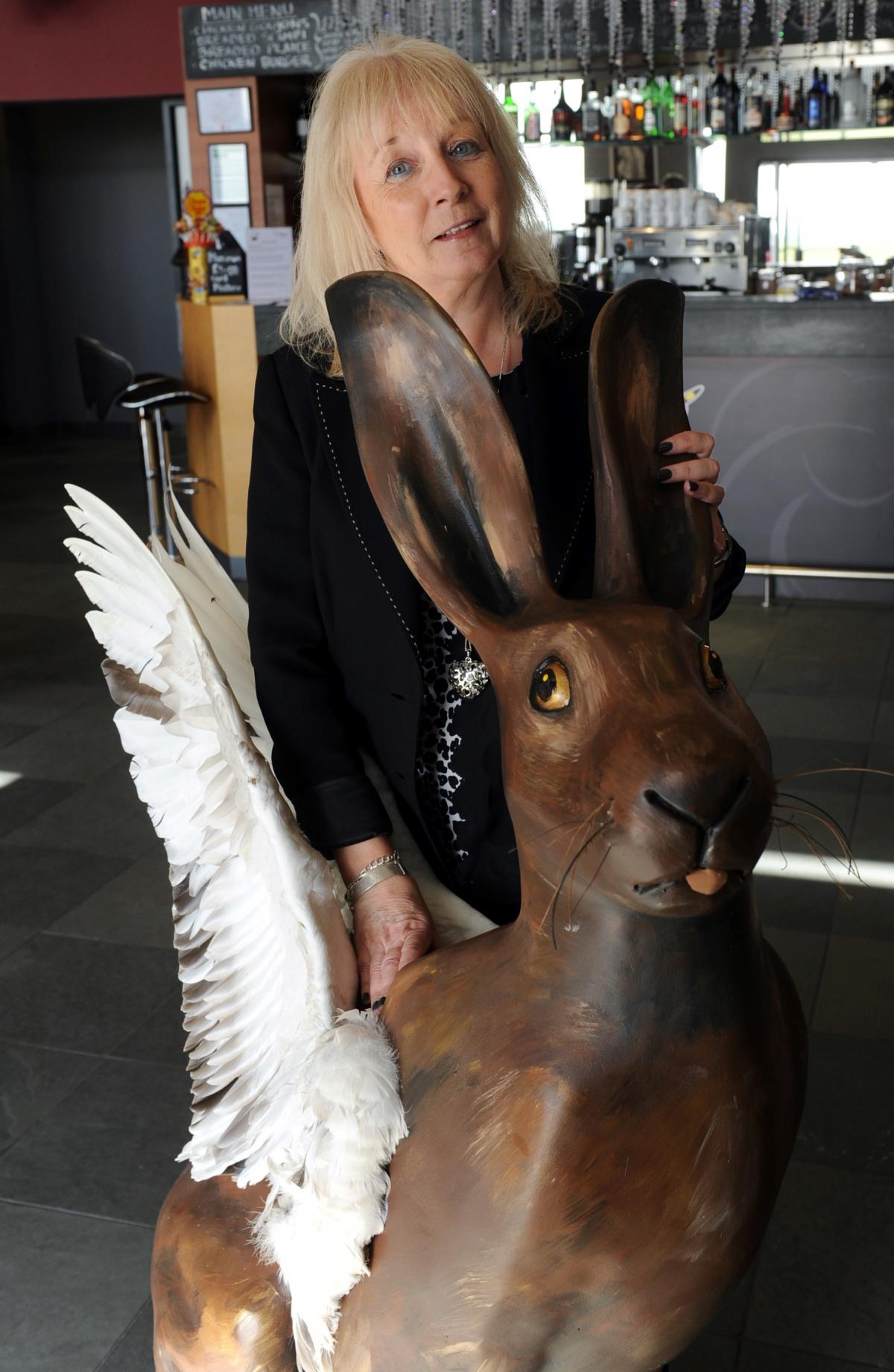 Susie Bennett, manager of AV8 at the Cotswold Airport with Hicarus by Suzannah Harvey