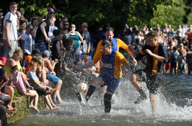 In Pictures Players Cool Off In Annual Bourton River