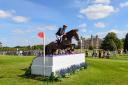 Tom Rowland and Possible Mission in action during the Dressage on day two of the 2023 Defender Burghley Horse Trials