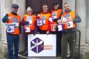 Cirencester Signpost volunteers taking part in their annual street collection in Cirencester town centre