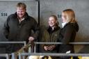 RAU students  Caitlyn Bartlett and Caitlin Oxton help Kaleb Cooper bid on calves at Cirencester Livestock Market