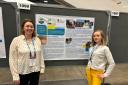 Nicola Cannon and Olena Melnyk with their poster at the American Geophysical Union (AGU) annual meeting