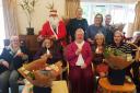 Volunteers and guests with Santa Claus