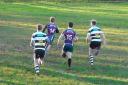 Dave Cooke (14) races in for Minety's try supported by Chris Rule (15)