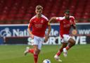 Swindon's Scott Twine and Swindon's Dominic Thompson during the match between Swindon Town and Ipswich Town at The County Ground Stadium , Swindon, England on Saturday the 1st of May 2021. The EFL League One, Photo by Rob Noyes..