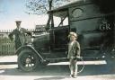 Unknown child in front of a mail wagon at the Cirencester town station, c. 1940. (OldCiren).