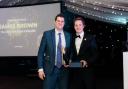 James Brown receives his award from Coaching Inn Group COO Edward Walsh