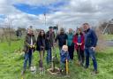 Latton Jubilee Garden driving force Jackie Blain (2nd from right) and her band of volunteers enjoyed a productive morning planting apple trees.