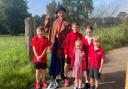 Tweedy the clown with Stratton Primary School pupils