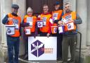 Cirencester Signpost volunteers taking part in their annual street collection in Cirencester town centre