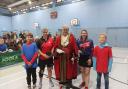 Town mayor Gavin Grant with the England players after the match at The Activity Zone
