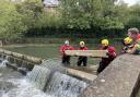 Malmesbury Fire Station volunteers fixing the weir