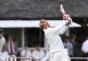 Shane Warne is bowled going for another big six