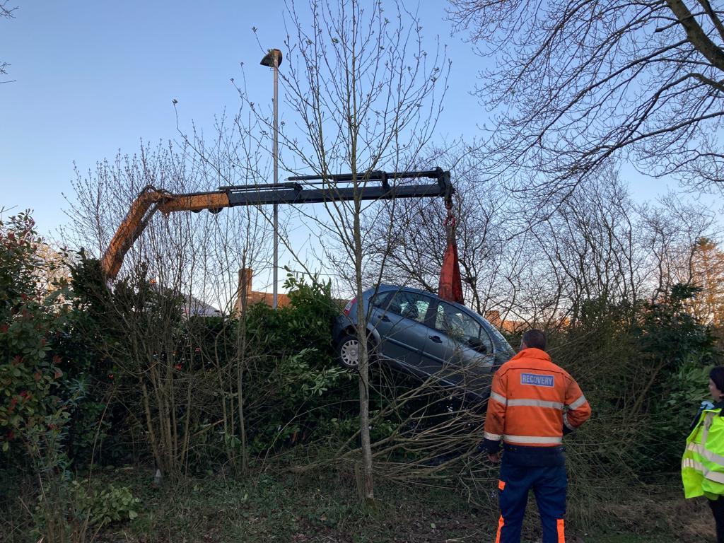A car is removed from Sarahs garden