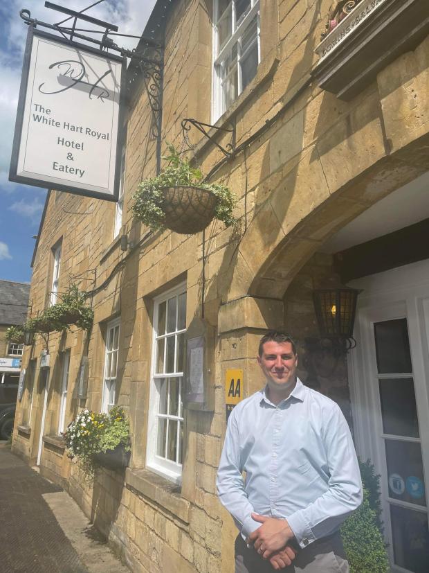 Wilts and Gloucestershire Standard: James Brown outside The White Hart Royal in Moreton