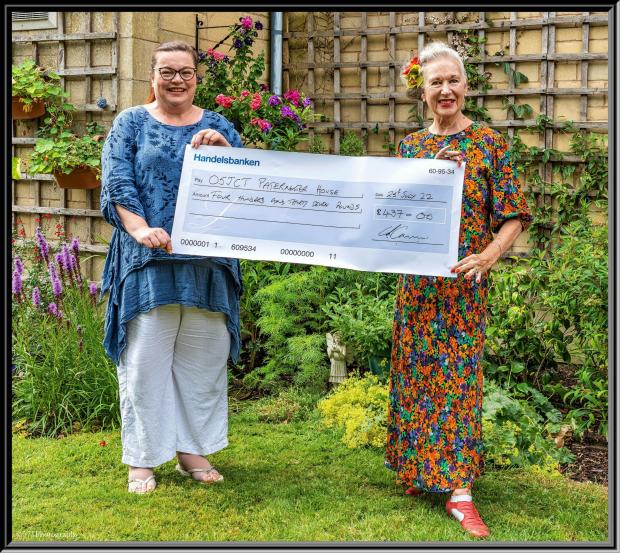 Wilts and Gloucestershire Standard: Sheila Lloyd Graham presents a cheque to Hannah Forsyth 