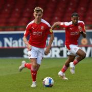 Swindon's Scott Twine and Swindon's Dominic Thompson during the match between Swindon Town and Ipswich Town at The County Ground Stadium , Swindon, England on Saturday the 1st of May 2021. The EFL League One, Photo by Rob Noyes..