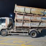 The driver of this dangerously-loaded skip lorry has been fined £880