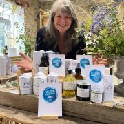 Joanna Walker with her ANI Skincare products