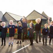Children outside the new Key Stage 1 classrooms at Ashton Keynes Primary School