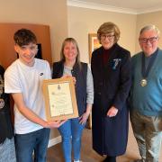 Ben Thornbury picking up the award from the High Sheriff of Wiltshire, alongside Kim Power, mayor of Malmesbury (left) and Deputy mayor and Wiltshire Councillor for Malmesbury, Councillor Gavin Grant (right)