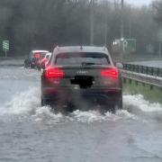 Flooding on the A419 in Cirencester in January. Picture by James Poulton