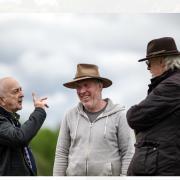 Richard Osgood (centre) with TV presenter Tony Robinson and Tim Taylor, director of Time Team