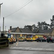Police cars outside Kemble station after the incident