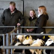 RAU students  Caitlyn Bartlett and Caitlin Oxton help Kaleb Cooper bid on calves at Cirencester Livestock Market