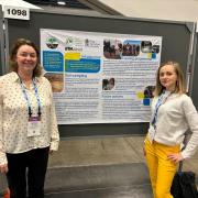 Nicola Cannon and Olena Melnyk with their poster at the American Geophysical Union (AGU) annual meeting