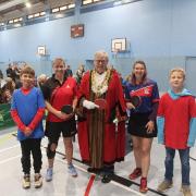 Town mayor Gavin Grant with the England players after the match at The Activity Zone