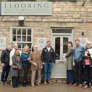 James Padden with mayor Liz Farnham and guests outside his new flooring showroom in Tetbury