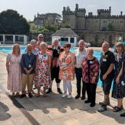 The team from Cirencester Open Air Swimming Pool with the Lord Lieutenant of Gloucestershire Edward Gillespie (right) and Air Marshal Sir David Walker (left)