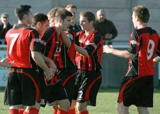 Cirencester Town celebrate Mitch Bryant's opening goal