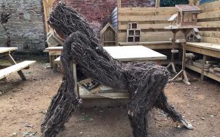 A life-size gorilla sculpture made from roofing battens and ivy made by one of the students